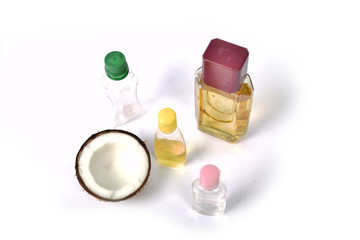 Coconut oil with coconut on white background.