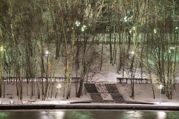 cityscape of the Moscow river embankment decorated to the new year, sparrow mountains