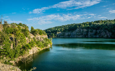 Fototapeta na wymiar Scenic mountain lake in the Rockies of Colorado and the blue sky