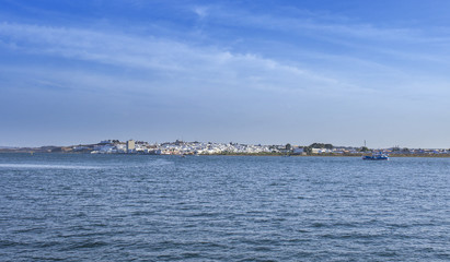 Fototapeta premium Ayamonte skyline show from Vila Real de Santo Antonio docks