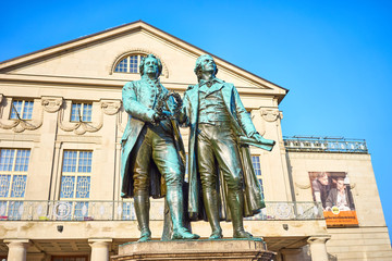 Famous sculpture of Goethe and Schiller in the city of Weimar in Germany / Most famous classical german authors / 18th century