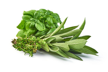 Bunch of sage, thyme and basil, isolated on white background.