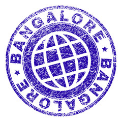 BANGALORE stamp imprint with grunge effect. Blue vector rubber seal imprint of BANGALORE tag with dust texture. Seal has words arranged by circle and globe symbol.
