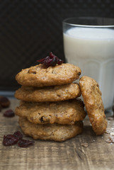 Homemade oatmeal cookies on wooden board. Sweet dessert snack with dry fruits. Healthy Food. Copy space. Banner.