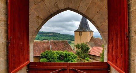 Fototapeta na wymiar church behind french castle in the summer