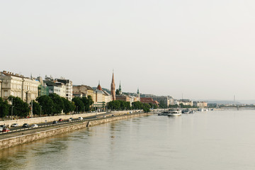 amazing  view of old coast at river and sidewalk in the morning light in Budapest city, travel concept, space for text