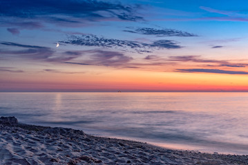 Fototapeta na wymiar Sunset on the beach at Dranske on Rügen
