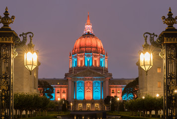 San Francisco City Hall illuminated in Turquoise and Orange. Shot from outside the War Memorial...