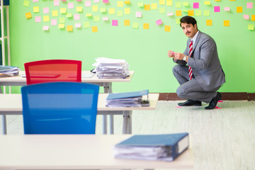 Businessman with many conflicting priorities   