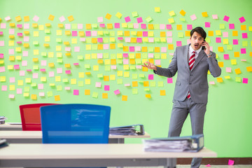 Businessman with many conflicting priorities   