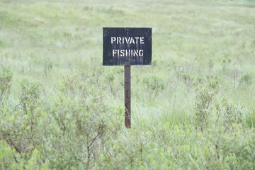 Private fishing sign no access countryside river land for anglers