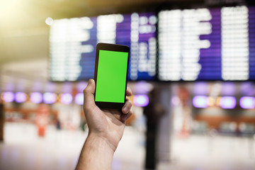 Cropped shot view of a man's hands holding cell telephone,