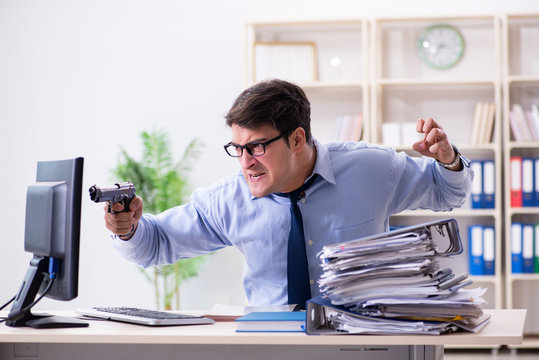 Stressful businessman working in the office  