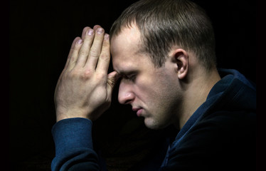 Young man praying