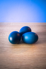 Easter Eggs on Wooden Background