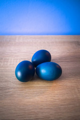 Easter Eggs on Wooden Background
