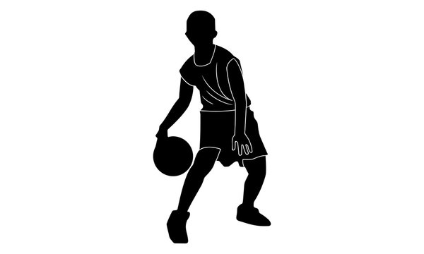 silhouette of a boy is dribbling the ball with his right hand.