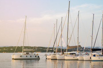 Sailing yachts in harbor. Lifestyle, travel concept.