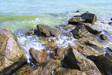 View of the Black Sea with large stones on a summer sunny day,  Ukraine