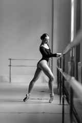 Fototapeta na wymiar Beautiful ballerina training in the class