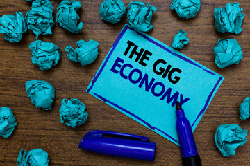 Conceptual hand writing showing The Gig Economy. Business photo showcasing Market of Short-term...