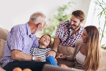 Portrait of a three generation family spending time together at home