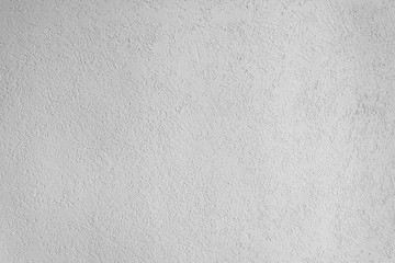 Naklejka premium texture of the surface of the wall covered with decorative plaster of the woodworm type