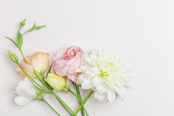 Obraz na płótnie Canvas Bouquet of flowers in gentle tones, top view