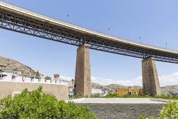 Fototapeta premium the road bridge at Santa Fé de Mondujar town, Almeria, Andalusia, Spain