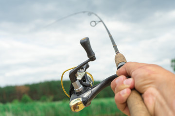 Spinning fishing is an exciting activity. Sport fishing.
