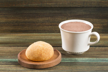 Almojabana, traditional Colombian food - Drink of chocolate. Top view