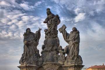 Statue of Madonna, St. Dominic and St. Thomas Aquinas in Prague, Czech Republic