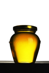 Honey jar isolated on white
