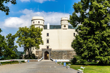 Fototapeta na wymiar Orlik castle with blue sky and trees-Orlik nad Vltavou South Bohemia, Czech Republic