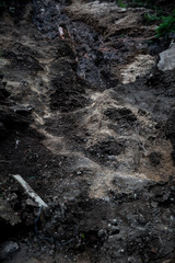 A crack in the ground.Sand pit