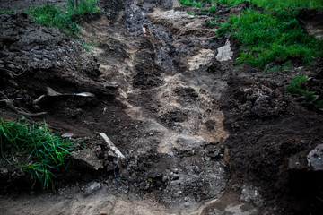 A crack in the ground.Sand pit