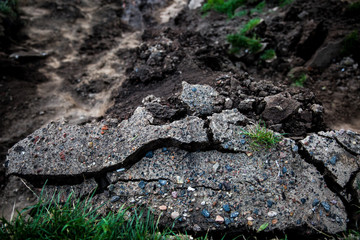 A crack in the ground.Sand pit