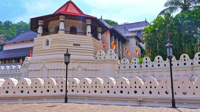 Traveling to Sri Lanka. Beautiful architecture of Buddhist temple in Kandy town. Sacred Buddha Tooth temple or Sri Dalada Maligawa at sunny day panoramic view