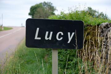 Road sign of the little french town Lucy