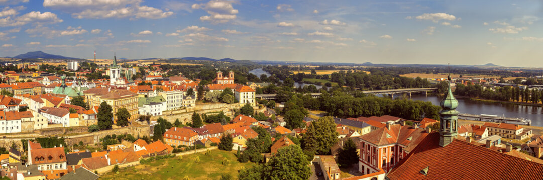 Wide panorama of Litomerice, historic city north of Prague, Check Republic, with Elbe (Labe) river, aerial view.