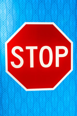 stop sign on abstract blue background - 214690593