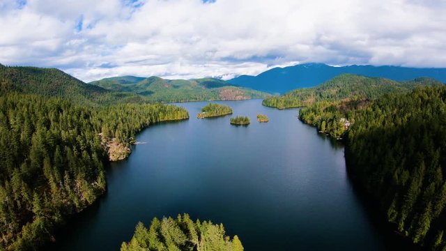 Sakinaw Lake BC Aerial Flying Through Channel Above Small Islets