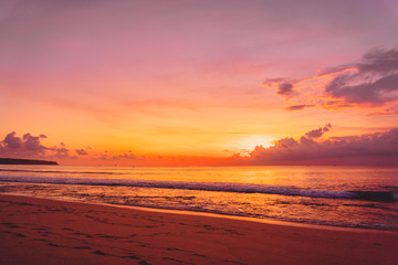 Fototapeta na wymiar Colorful sunset or sunrise at tropical beach with ocean in Bali