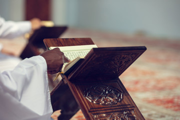 Two Religious muslim man praying inside the mosque