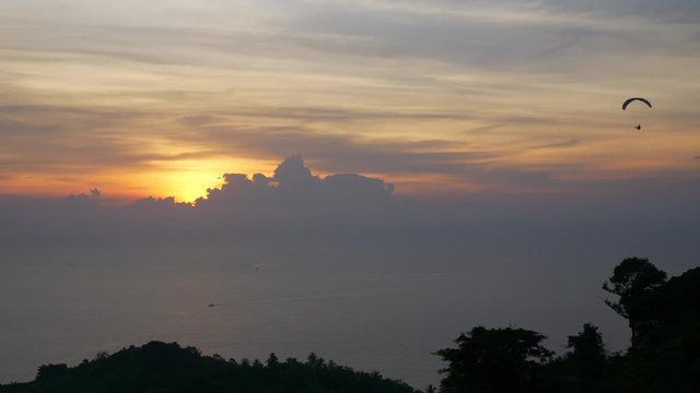 sunset time phuket island paragliding sky view 4k thailand
