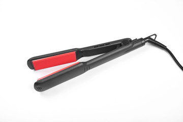 Hair straightener isolated on white
