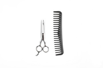 Professional hairdresser tools on white background with copy space