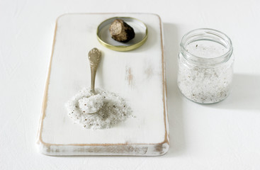 Sea salt with truffle and truffle on a light background. Rustic style.