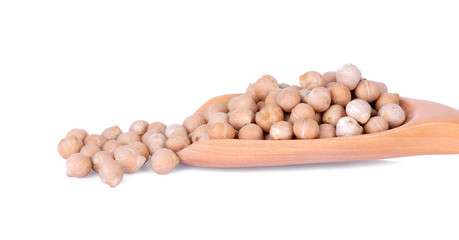 Close-up uncooked chickpeas in wooden spoon on white background.