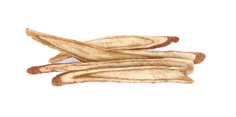 dried Liquorice roots on a white background.